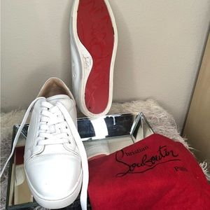 Pre love Christian Louboutin tennis shoe gently used